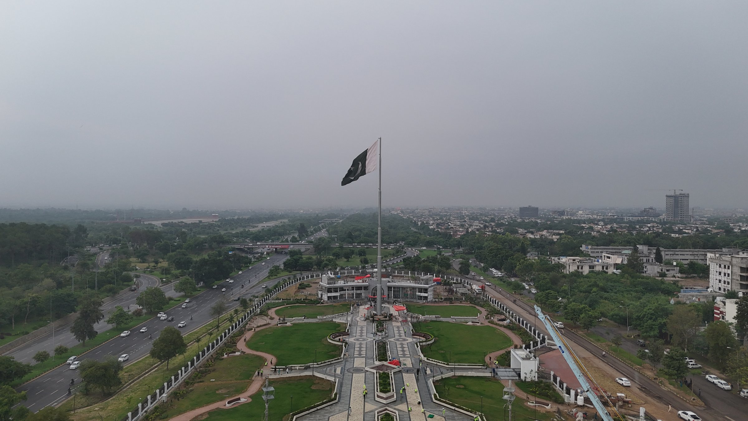 Aerial view of the Yadgar-e-Fatah monument site in Islamabad with the flagpole and landscaped grounds